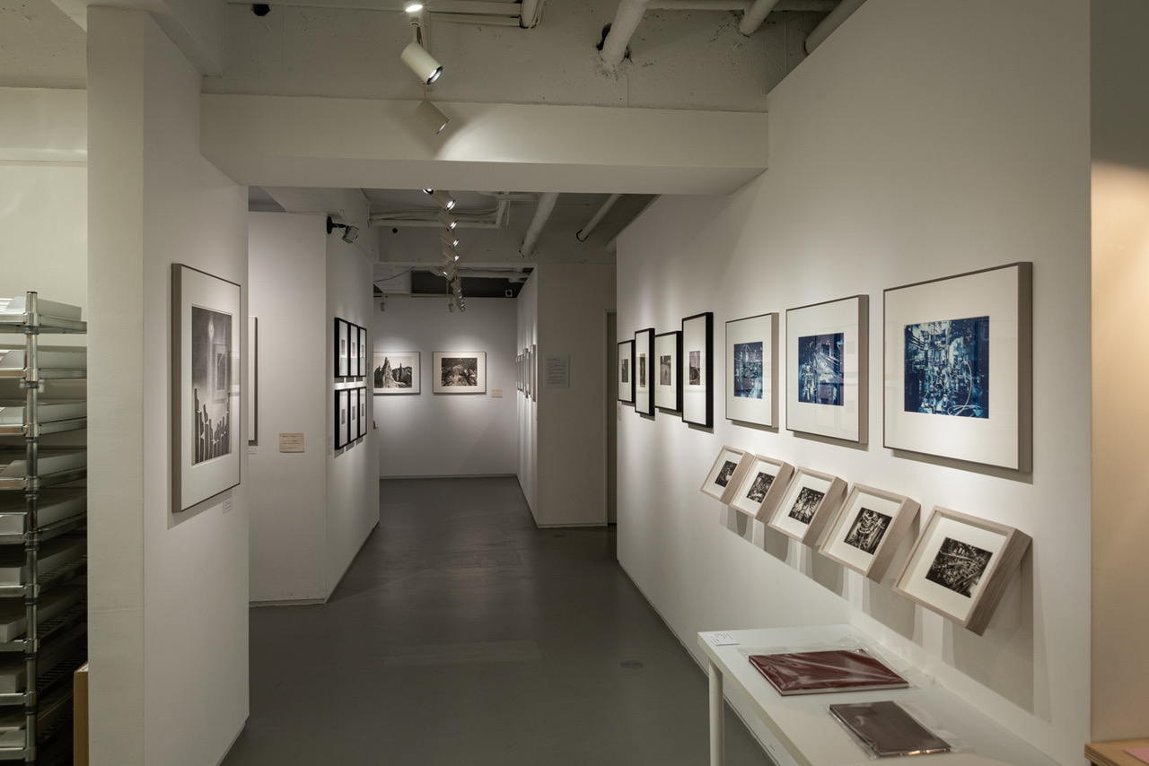 View of framed photographs displayed in the PGI group exhibition